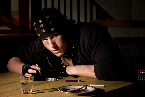 Man snorting cocaine or heroin