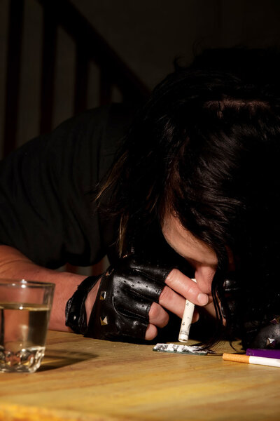 Man snorting cocaine or heroin