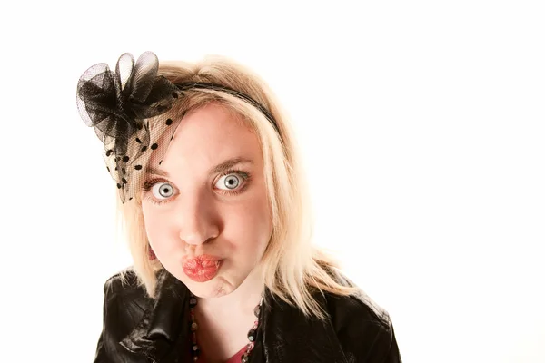 Pretty young woman making a funny face Stock Image