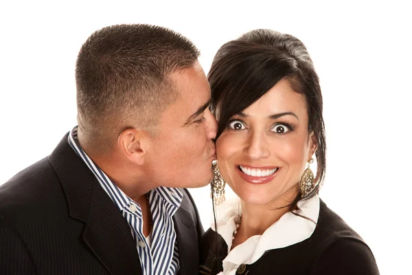 Hispanic man kissing pretty woman Stock Photo