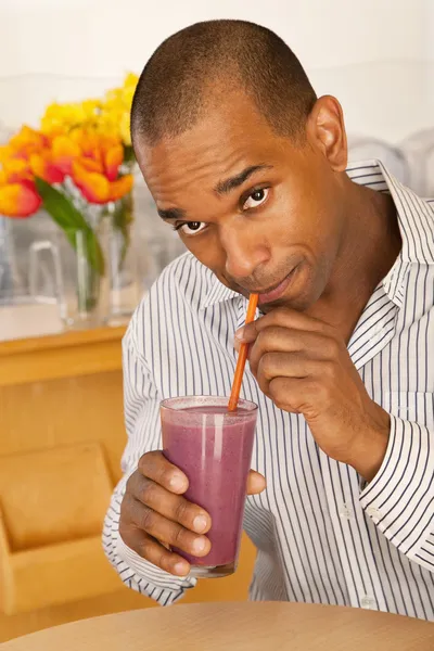 Young man at a cafe — Stock Photo, Image