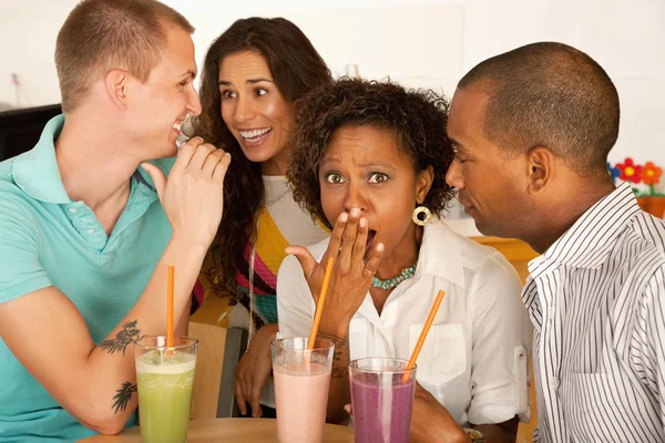 Two couples at a cafe drinking frozen beverages — Stock Photo, Image