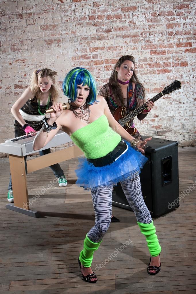 Female punk rock band — Stock Photo © creatista 40176321