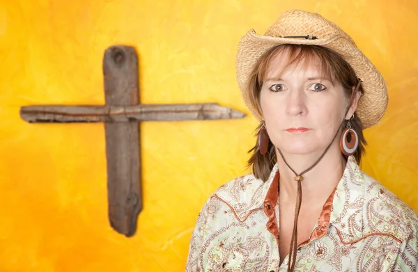 Woman in front of Wooden Cross — Stock Photo, Image