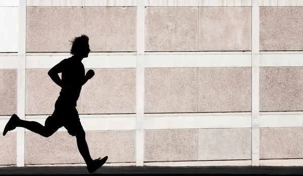 Man runs for exercise — Stock Photo, Image