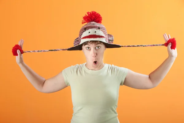 Woman Plays with Hat — Stock Photo, Image