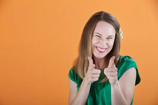 Frau zeigt Zeigefinger — Stockfoto