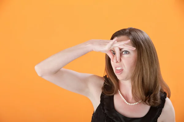 Vrouw wringt haar neus — Stockfoto