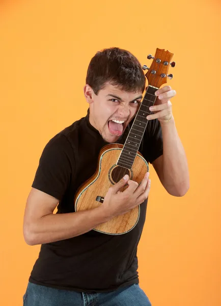 Young ukulele player — Stock Photo, Image