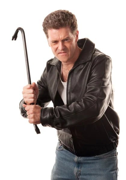 Angry man holding a crowbar — Stock Photo, Image