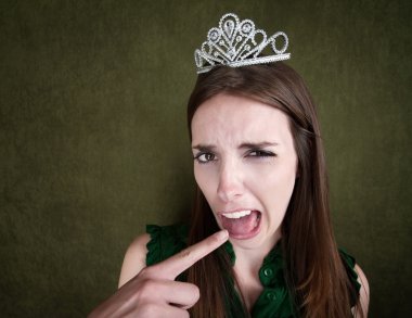 Young Queen Makes a Gagging Gesture clipart