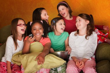 Group Of Little Girls Watch Television clipart