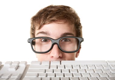 Teen Behind Computer Keyboard