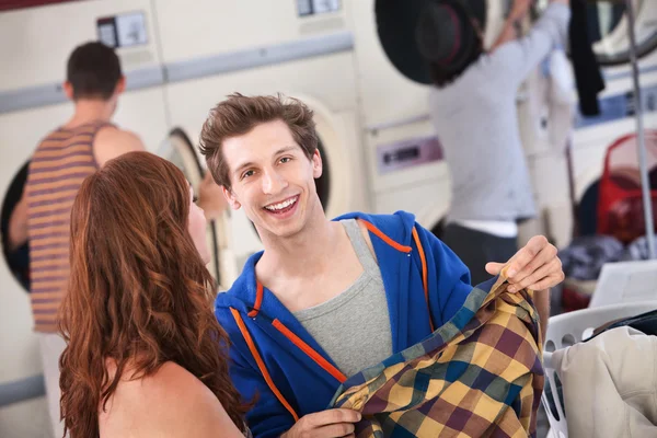 Young Couple in the Laundromat — Stock Photo, Image