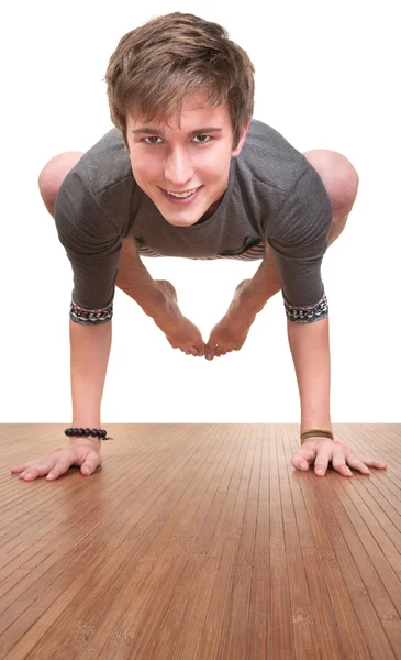 Tiener in bakasana houding — Stockfoto