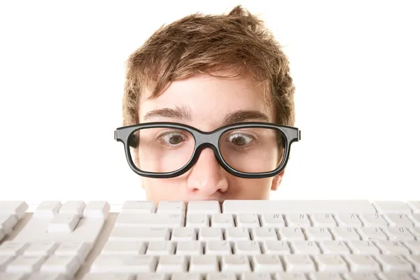 Man Behind Computer Keyboard Stock Photo