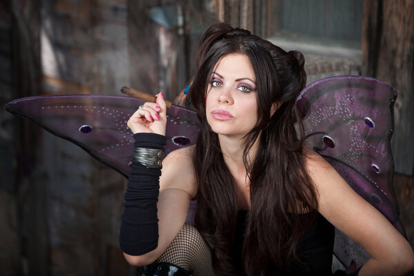 Fairy Holds a Cigar