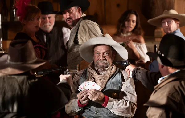 Scared Gambler with Guns in His Face — Stock Photo, Image