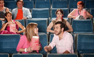 Loud Couple in Theater clipart