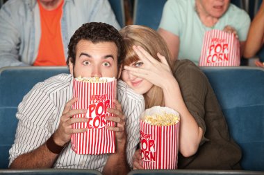 Scared Couple At Movies clipart