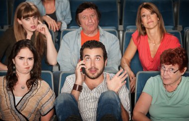 Man On Phone In Theater clipart