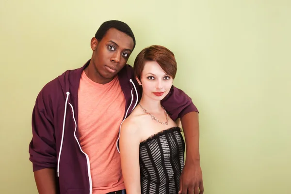 Mixed race couple stare at the camera — Stock Photo, Image