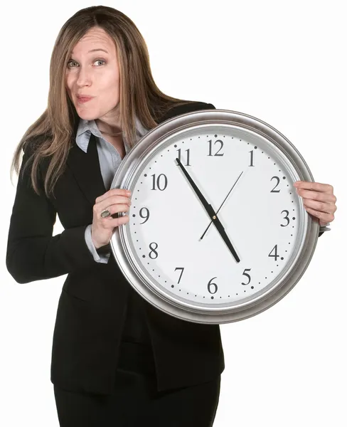 Businesswoman With Big Clock Royalty Free Stock Photos