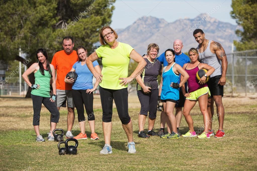 Woman Posing with Fitness Class — Stock Photo © creatista 41998229