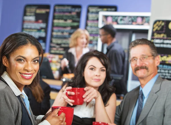 Mujer profesional con amigos — Foto de Stock