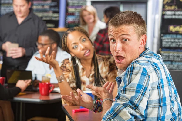 Embarrassed Man in Cafe — Stock Photo