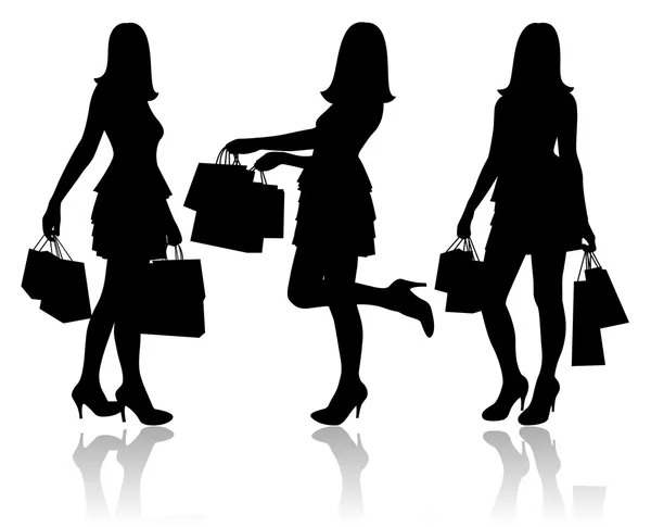 Ženy s nákupními taškami — Stockový vektor
