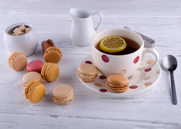 Polka Dot Cup Tea Lemon Macaroons Different Tastes Sugar White — Zdjęcie stockowe