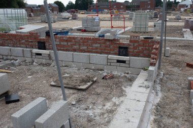New house under construction on new residential housing development construction site