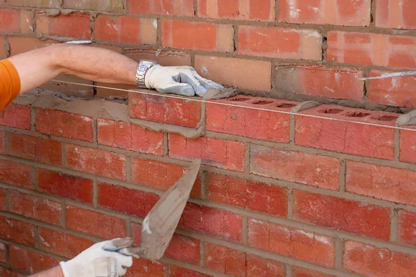 Bricklayer Laying Bricks Mortar New Residential House Construction Another Brick — Stock Photo, Image