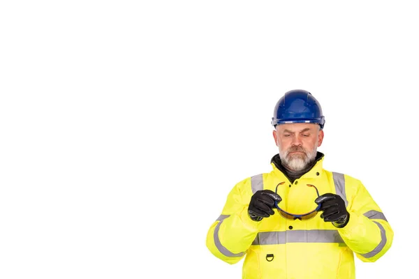 Ein Bauarbeiter Leuchtend Gelbem Viz Mantel Und Schutzhandschuhen Mit Getönter — Stockfoto