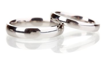 Wedding rings isolated on white clipart