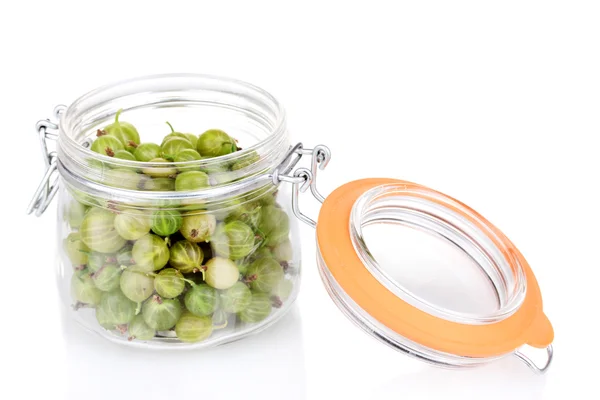 Green gooseberry in jar isolated on white — Stock Photo, Image