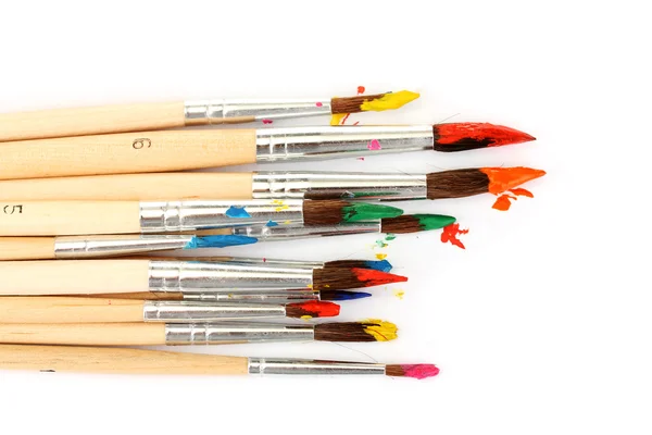 Paint brushes with gouache isolated on white — Stock Photo, Image