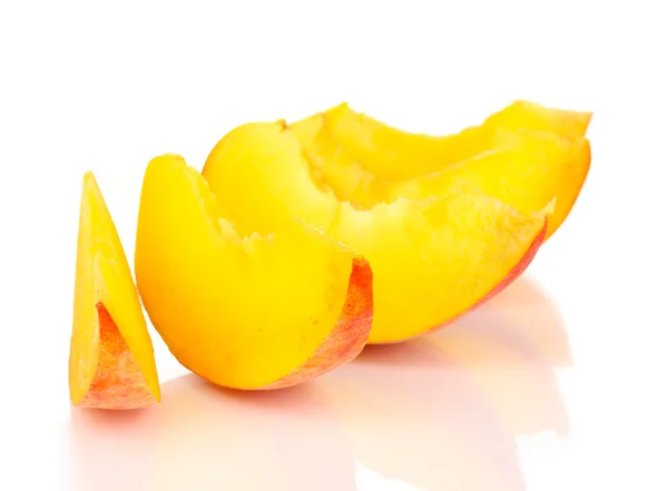 Ripe peach slices isolated on white — Stock Photo, Image