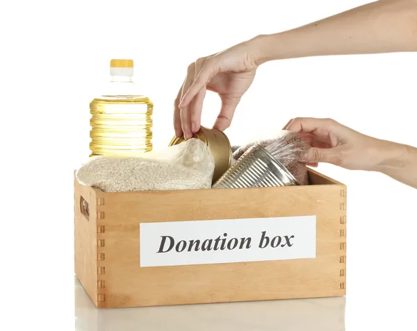 Donation box with food on white background close-up — Stock Photo, Image