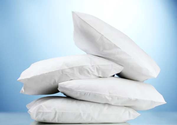 Pillows, on blue background — Stock Photo, Image