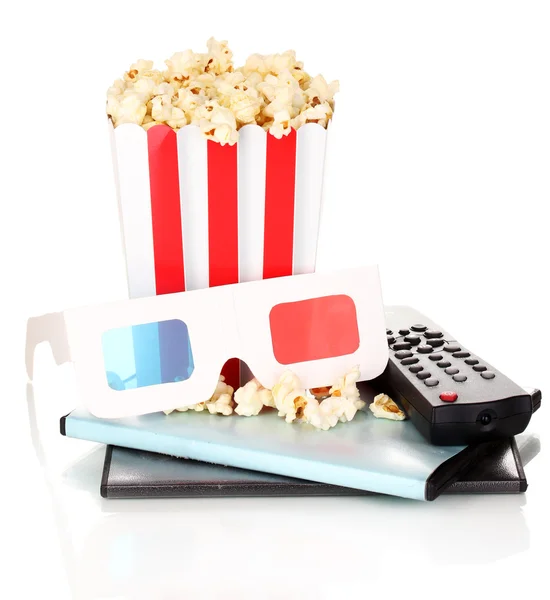 Popcorn con pannello di controllo TV e dischi isolati su bianco — Foto Stock