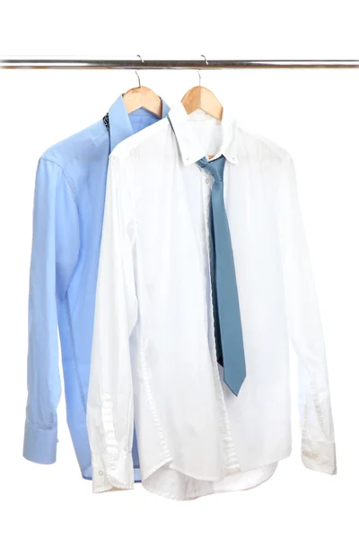 Blue and white shirts with tie on wooden hanger isolated on white — Stock Photo, Image