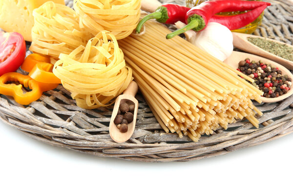 Pasta spaghetti, vegetables and spices, isolated on white
