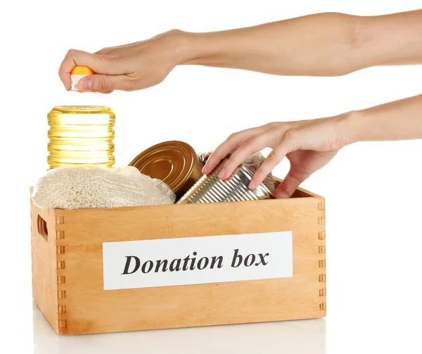 Donation box with food on white background close-up — Stock Photo, Image