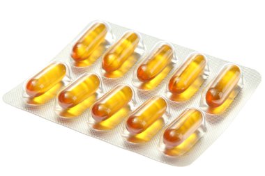 Kabarcıklara tıkılmış kapsüller, beyazlar üzerinde izole edilmiş.