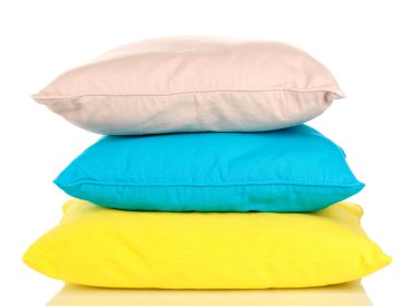 Bright color pillows isolated on white