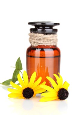 ilaç şişesi ve üzerinde beyaz izole çiçekler