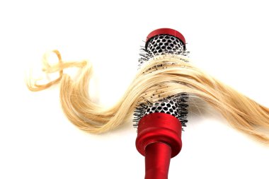 Blond curls brushing comb isolated on white clipart