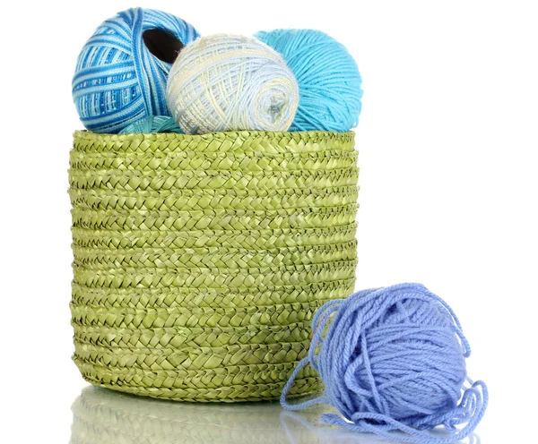 Colorful yarn for knitting in green basket isolated on white — Stock Photo, Image